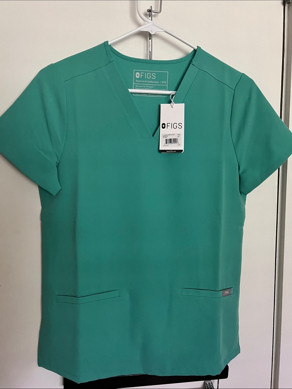 FIGS Women's Casma Teal Green V-Neck Scrub Top with Front Pockets XXS